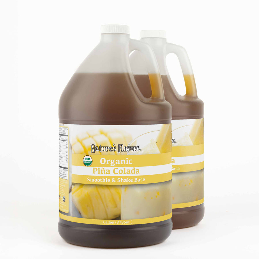 Two, 1 gallon bottles both with a label that read, "Organic Piña Colada Smoothie & Shake Base."