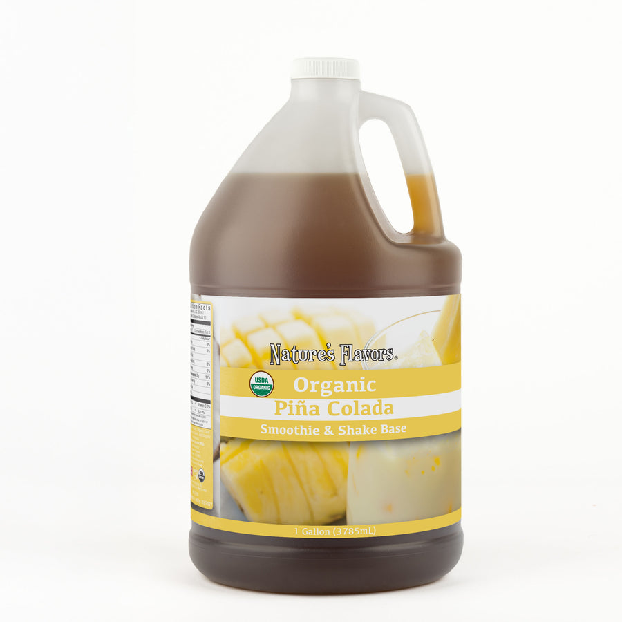 A 1 gallon bottle with a label that reads, "Organic Piña Colada Smoothie and Shake Base. 1 Gallon."
