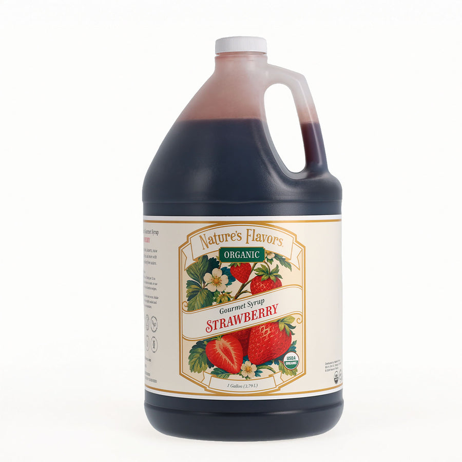 A large jug of Nature's Favors Organic Gourmet Strawberry Syrup, filled with dark red liquid, featuring a cream-colored label with illustrations of strawberries and white flowers, set against a plain white background.