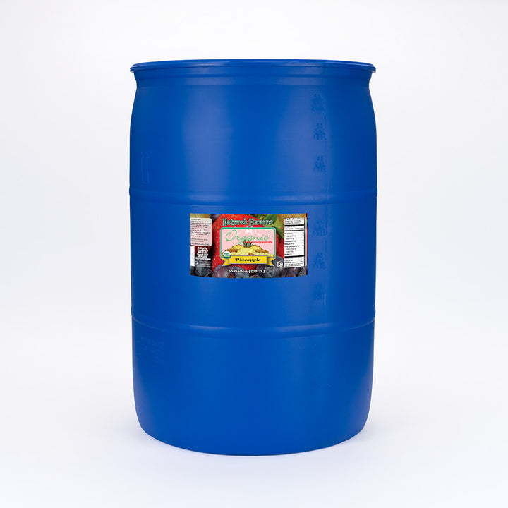 A large blue drum with a label that reads, "Organic Juice Concentrate, Pineapple. 55 gallon."
