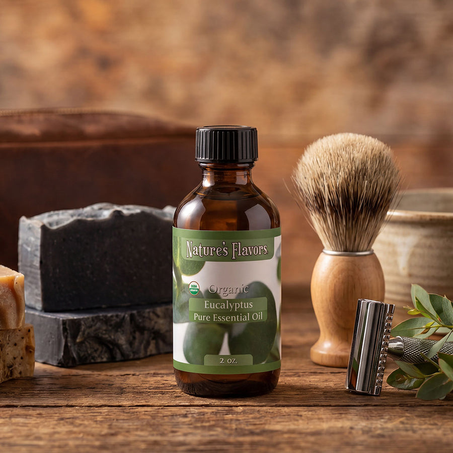 Bottle labeled, "Organic Eucalyptus Pure Essential Oil" next to shaving supplies for men. 