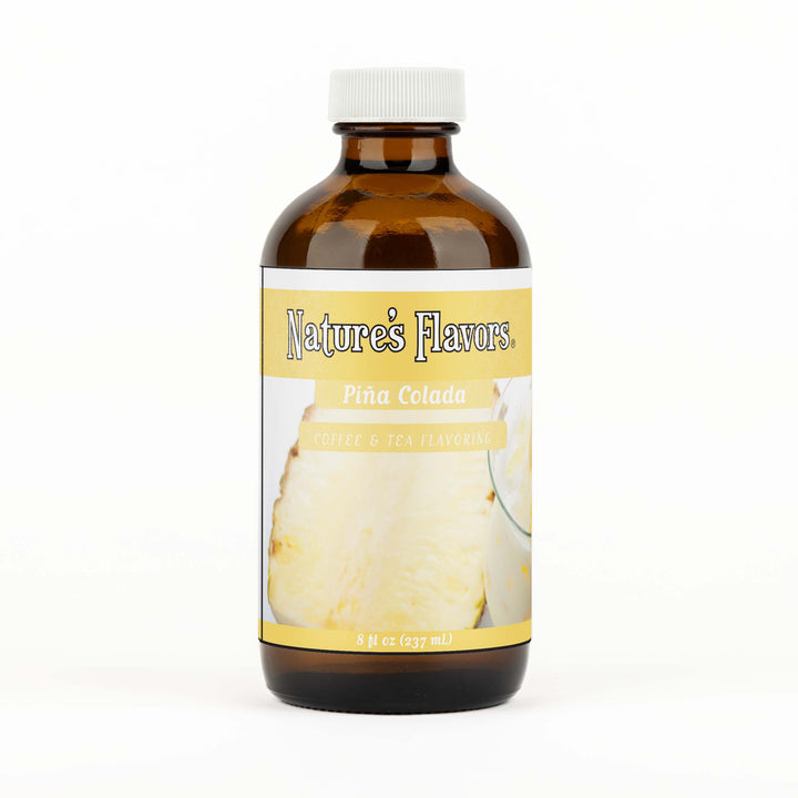 A brown bottle with a label that reads, "Piña Colada Coffee & Tea Flavoring. 8 fl oz."
