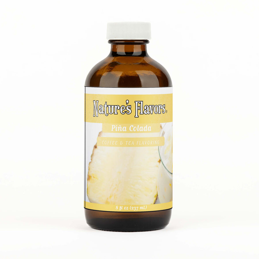 A brown bottle with a label that reads, "Piña Colada Coffee & Tea Flavoring. 8 fl oz."
