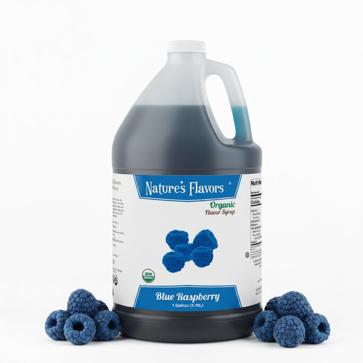 Jug labeled, "Organic Flavor Syrup Blue Raspberry" with blue raspberries next to it. 