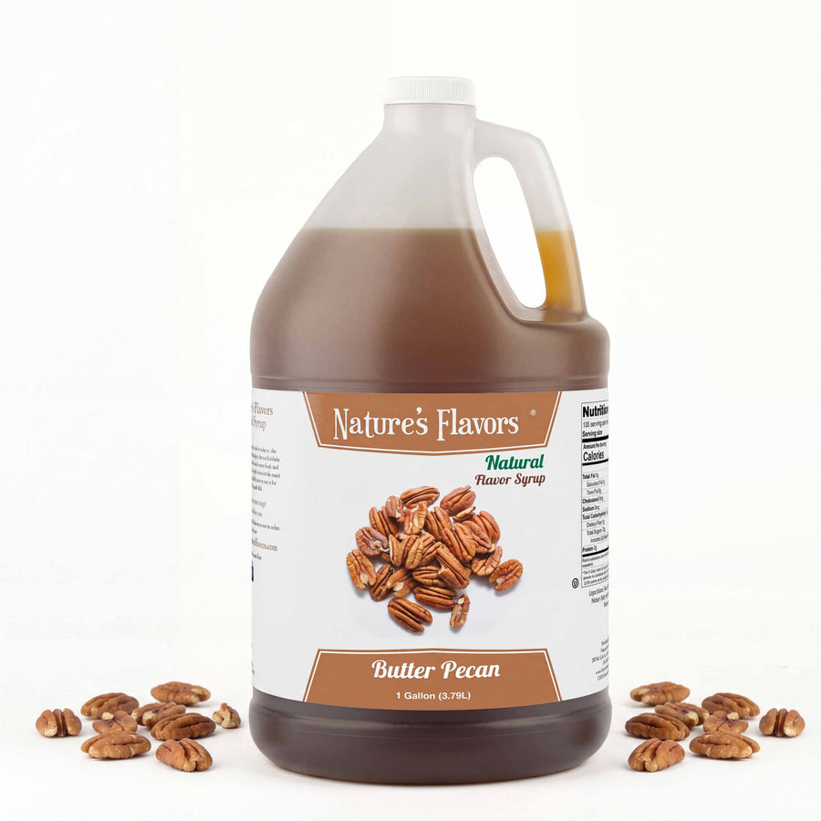 Jug labeled, "Natural Flavor Syrup Butter Pecan" with butter pecans next to it. 