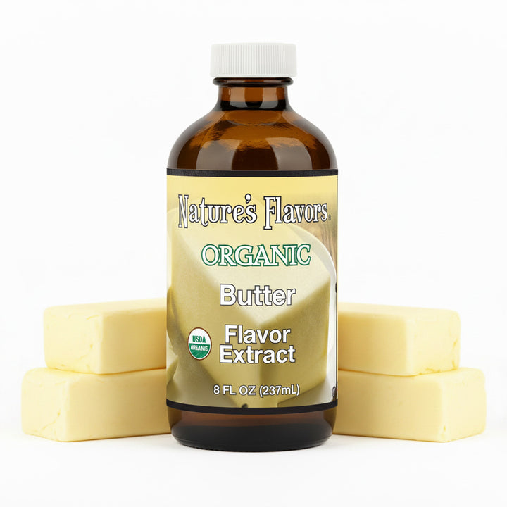bottle labeled, "Organic Butter Flavor Extract" with 4 sticks of butter behind it. 