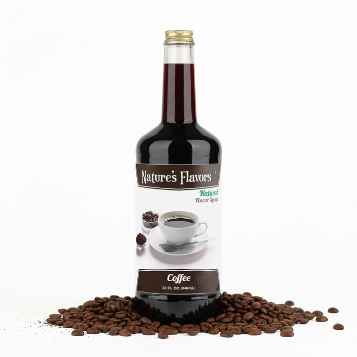 bottle labeled, "Natural Flavor Syrup Coffee" in a pile of coffee beans. 