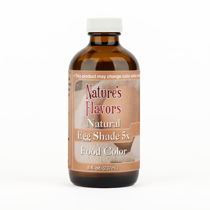 Brown bottle labeled “Natural Egg Shade 5x Food Color"