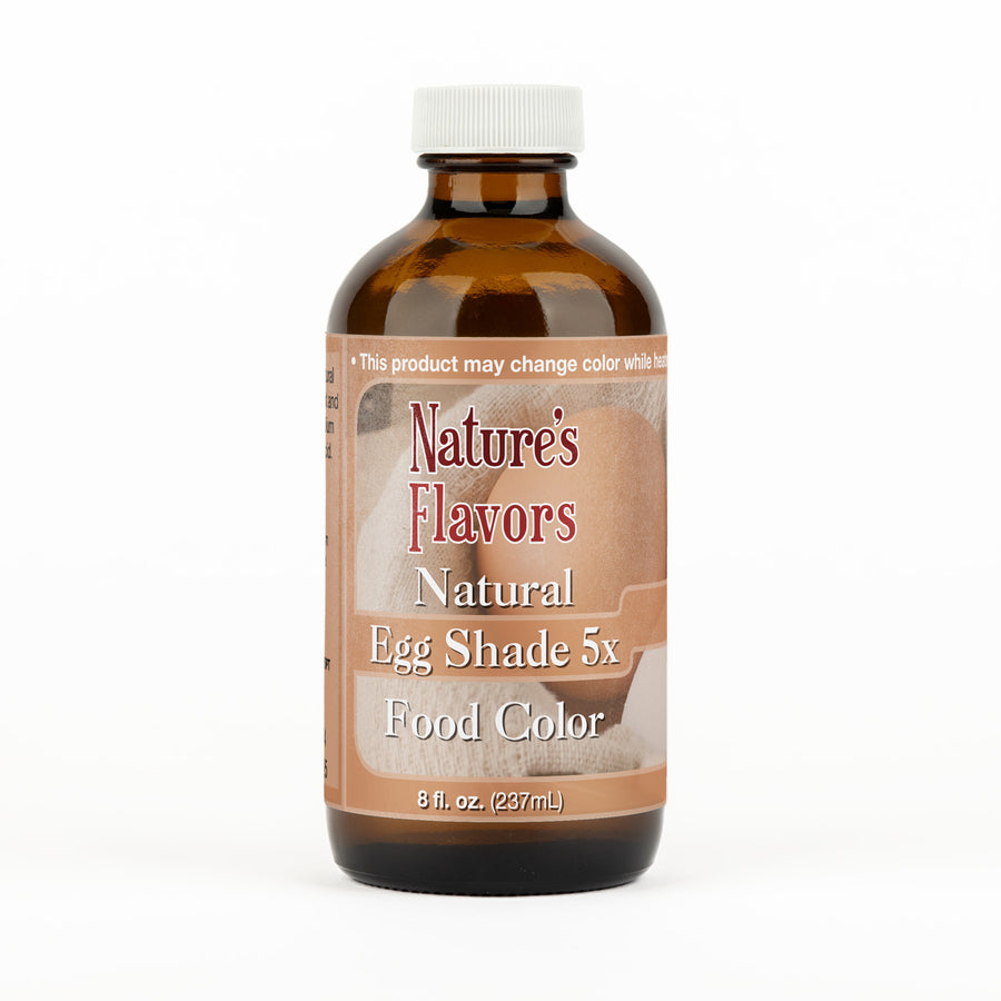 Brown bottle labeled “Natural Egg Shade 5x Food Color"