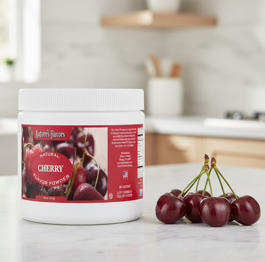 Nature's Flavors Cherry Flavor Powder container on a kitchen counter with fresh cherries.