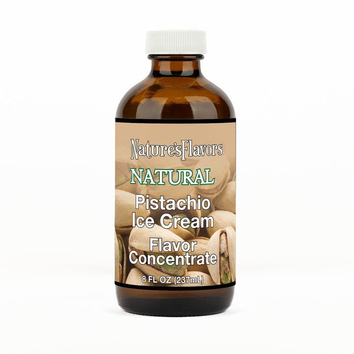 An 8 fl oz amber glass bottle of Nature's Flavors Pistachio Ice Cream Flavor Concentrate with a white cap, centered on a white background.