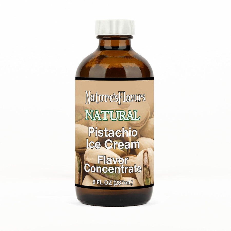 An 8 fl oz amber glass bottle of Nature's Flavors Pistachio Ice Cream Flavor Concentrate with a white cap, centered on a white background.