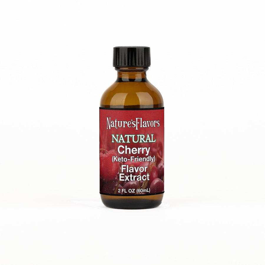 A 2 fl oz amber glass bottle of Nature's Flavors Cherry Flavored Extract, Keto-Friendly with a black cap, centered on a white background.