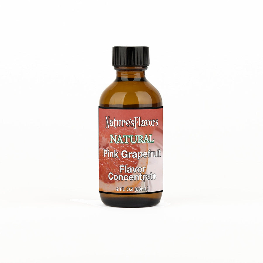 A 2 fl oz amber glass bottle of Nature's Flavors Pink Grapefruit Flavor Concentrate Without Diacetyl with a black cap, centered on a white background.