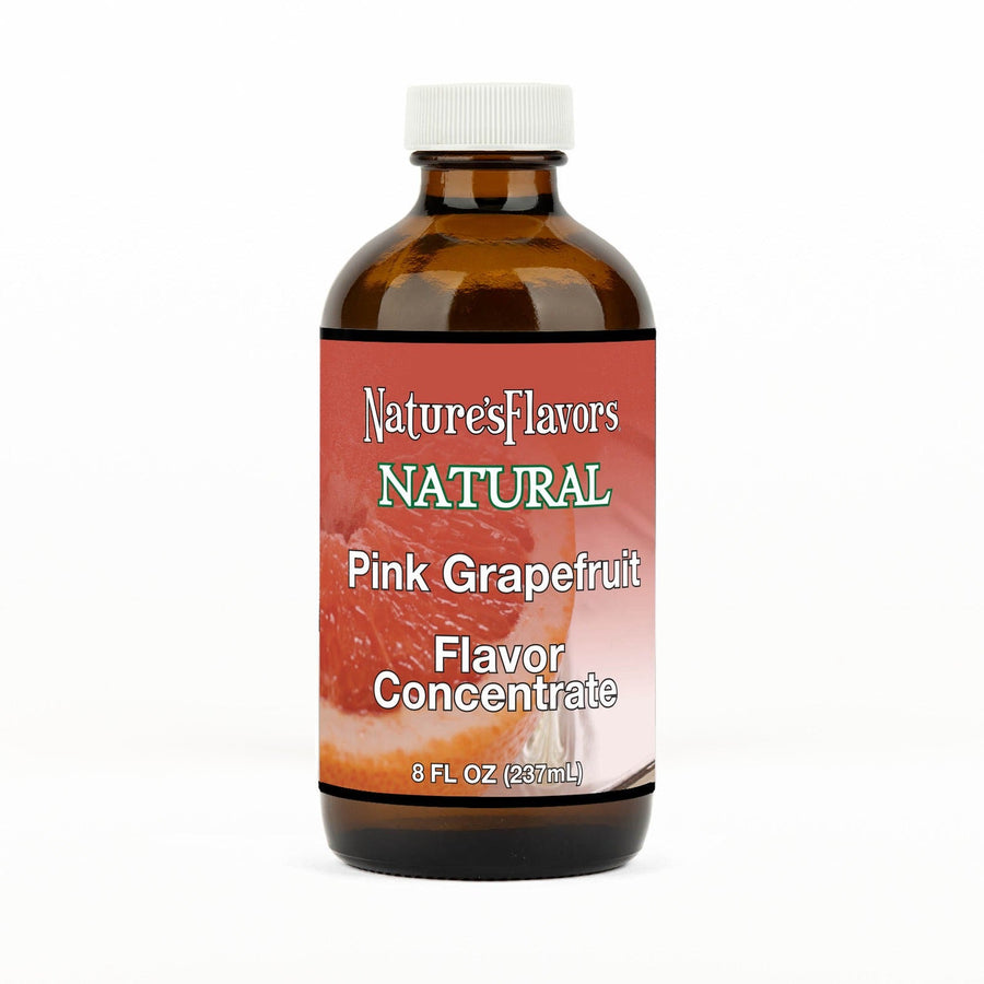 An 8 fl oz amber glass bottle of Nature's Flavors Pink Grapefruit Flavor Concentrate Without Diacetyl with a white cap, centered on a white background.
