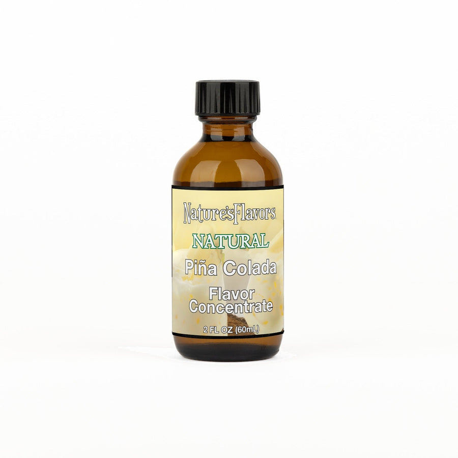 A 2 fl oz amber glass bottle of Nature's Flavors Pina Colada Flavor Concentrate Without Diacetyl with a black cap, centered on a white background.