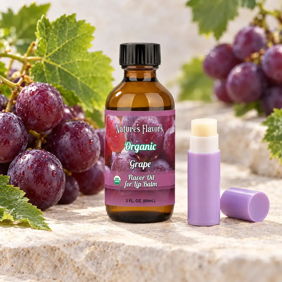 Nature's Flavors Organic Grape Flavor Oil for Lip Balm, 2 oz amber bottle with flavor-matched ingredients and an open lip balm.