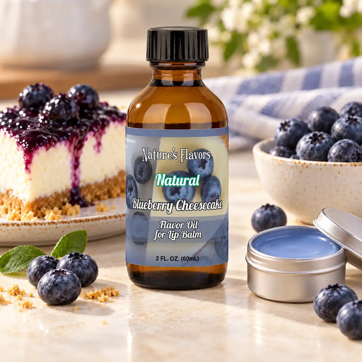 Nature's Flavors Blueberry Cheesecake Flavor Oil for Lip Balm, 2 oz bottle with flavor ingredients and open lip balm.