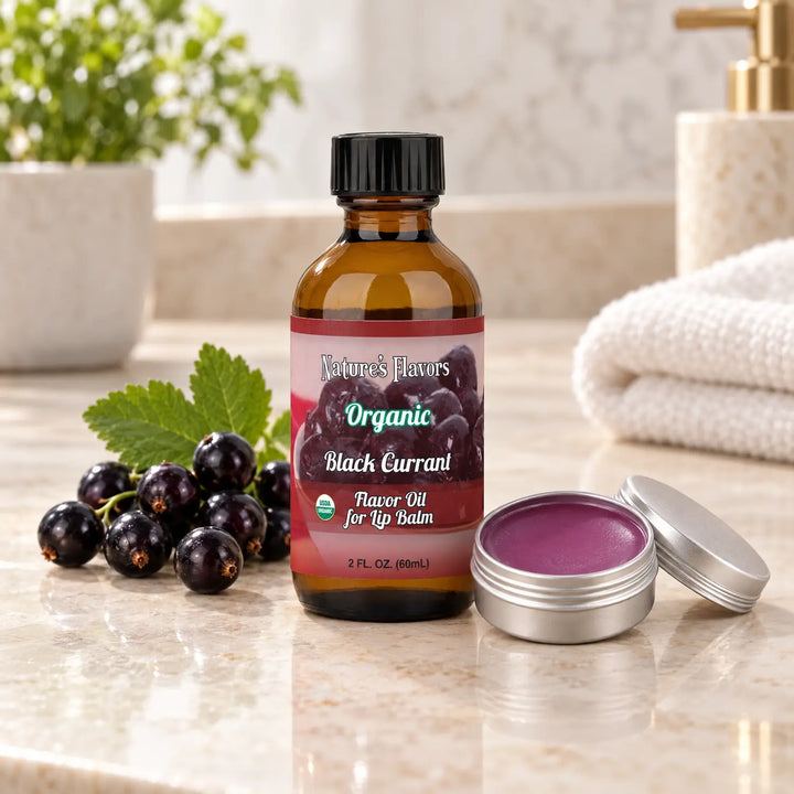 Nature's Flavors Organic Black Currant Flavor Oil for Lip Balm, 2 oz bottle with flavor cues and an open lip-balm tin.
