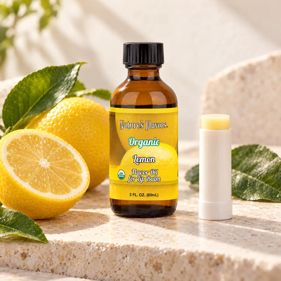 Nature's Flavors Organic Lemon Flavor Oil for Lip Balm, 2 oz amber bottle with flavor-matched ingredients and an open lip balm.