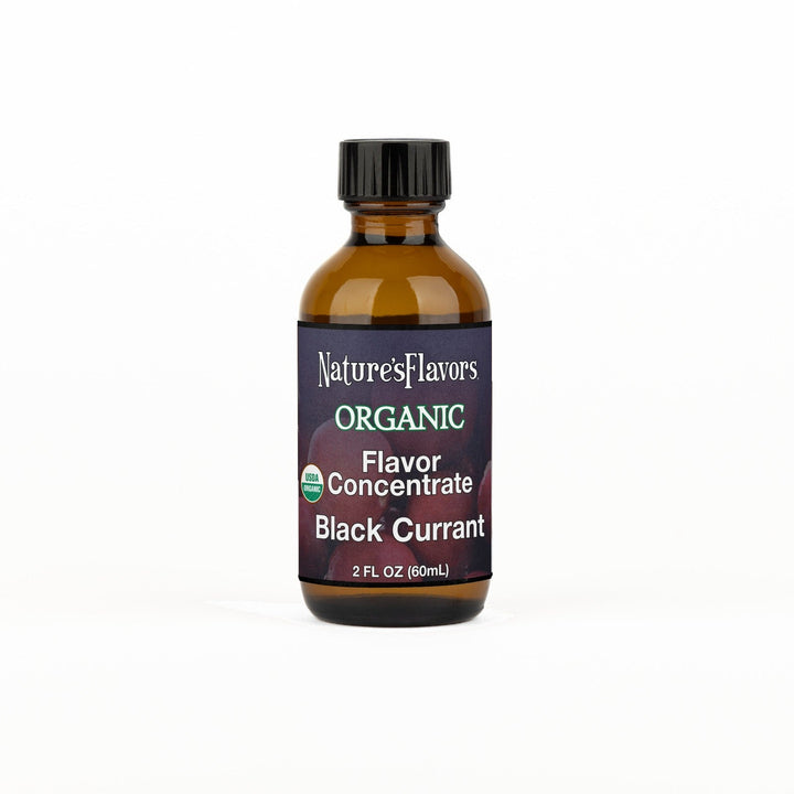 A 2 fl oz amber glass bottle of Nature's Flavors Organic Flavor Concentrate without Diacetyl, Black Currant with a black cap, centered on a white background.