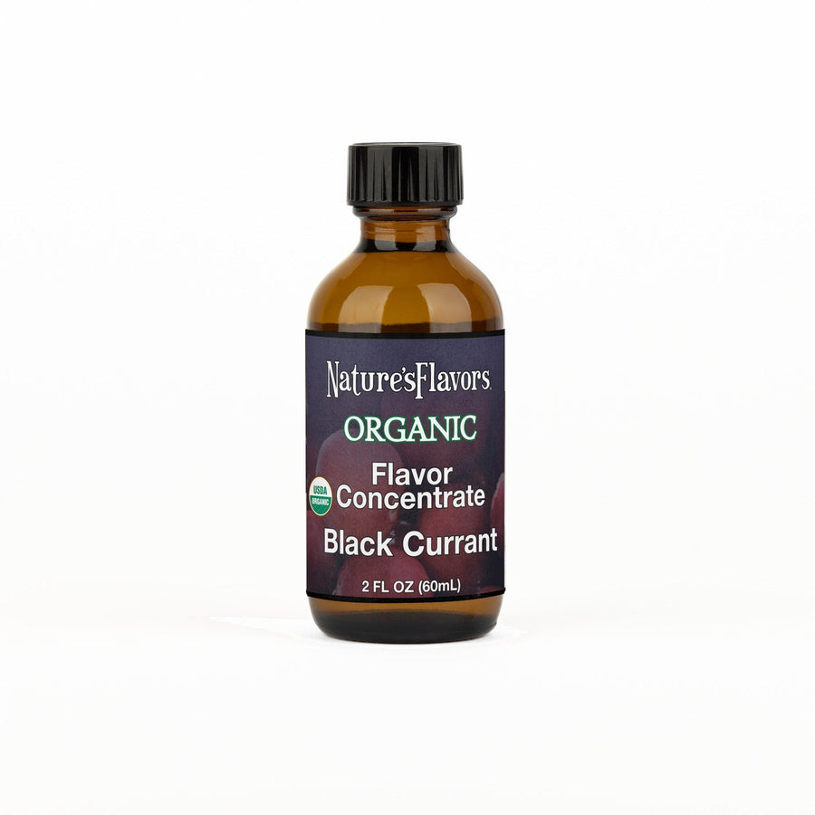 A 2 fl oz amber glass bottle of Nature's Flavors Organic Flavor Concentrate without Diacetyl, Black Currant with a black cap, centered on a white background.