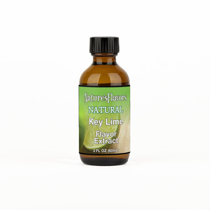 A 2 fl oz amber glass bottle of Nature's Flavors Key Lime Flavor Extract Without Diacetyl with a black cap, centered on a white background.