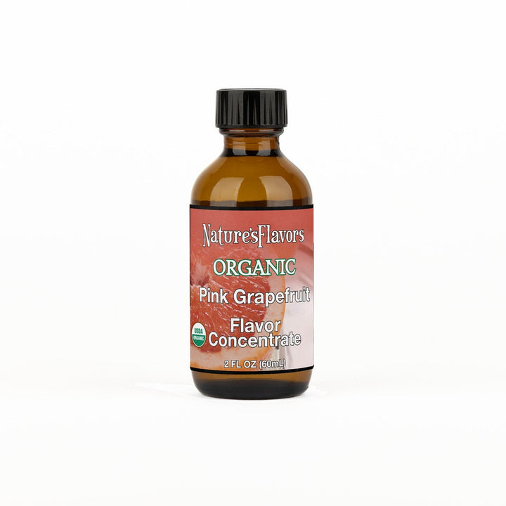 A 2 fl oz amber glass bottle of Nature's Flavors Organic Pink Grapefruit Flavor Concentrate Without Diacetyl with a black cap, centered on a white background.