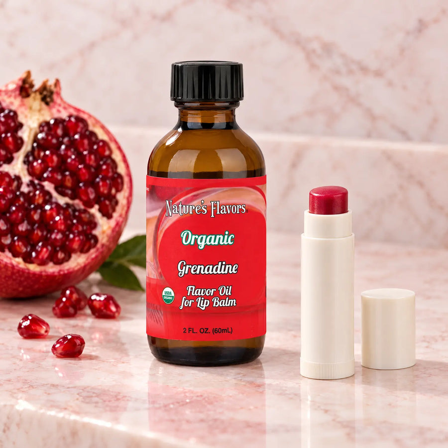 Nature's Flavors Organic Grenadine Flavor Oil for Lip Balm, 2 oz bottle with flavor cues and an open lip-balm tube.