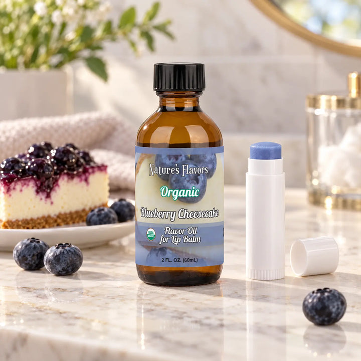 Nature's Flavors Organic Blueberry Cheesecake Flavor Oil for Lip Balm, 2 oz bottle with flavor cues and an open lip-balm tube.