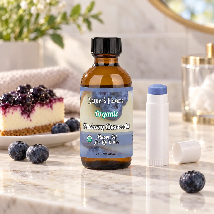 Nature's Flavors Organic Blueberry Cheesecake Flavor Oil for Lip Balm, 2 oz bottle with flavor cues and an open lip-balm tube.