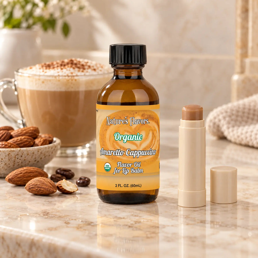 Nature's Flavors Organic Amaretto Cappuccino Flavor Oil for Lip Balm, 2 oz bottle with flavor cues and an open lip-balm tube.