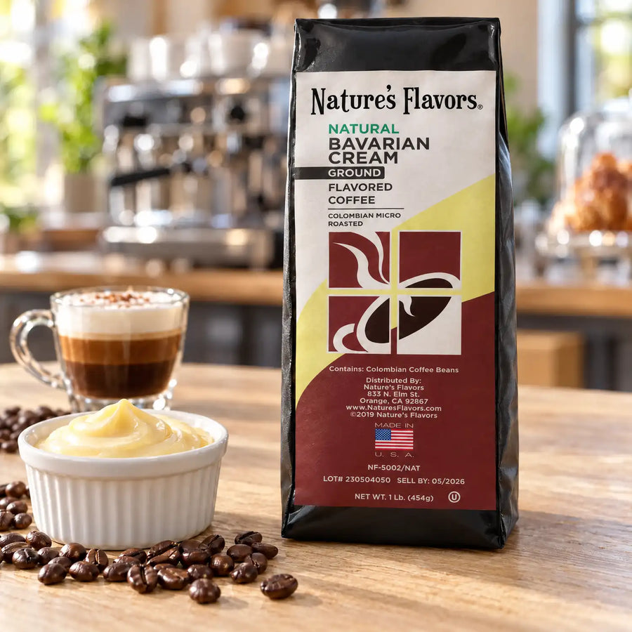 Nature’s Flavors Bavarian Cream Flavored Coffee Beans, 1 lb. Ground, in a black labeled bag beside Bavarian cream, whole roasted coffee beans and a filled coffee drink in a bright coffee scene.