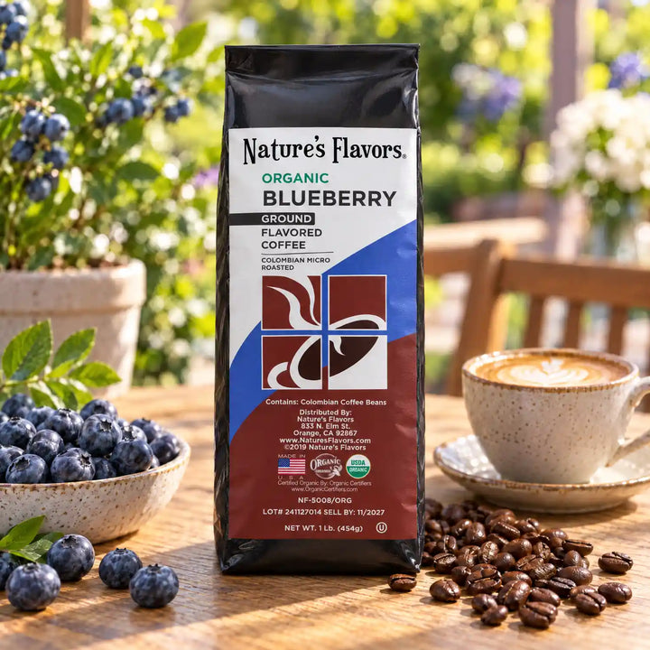 Nature's Flavors Organic Blueberry Flavored Coffee Beans, 1 lb. Ground, in a bright coffee lifestyle scene.
