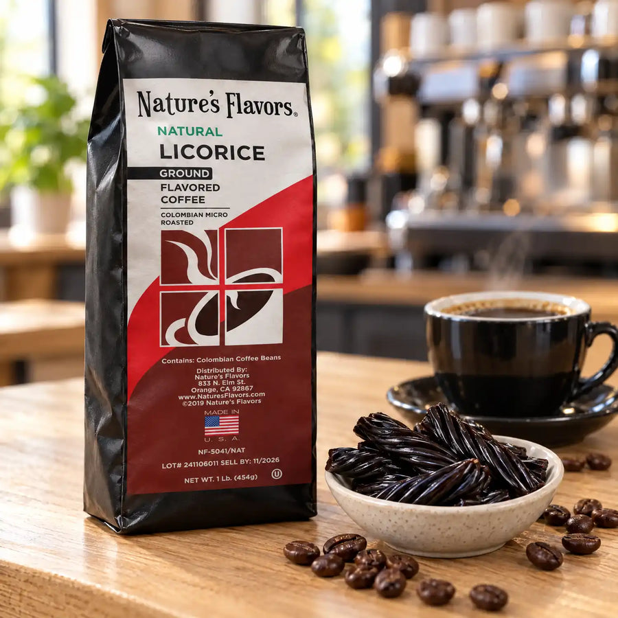 Nature’s Flavors Licorice Flavored Coffee Beans, 1 lb. Ground, in a black labeled bag beside black licorice, whole roasted coffee beans and a filled coffee drink in a bright coffee scene.