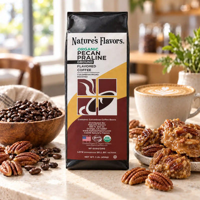 Nature's Flavors Organic Pecan Praline Flavored Coffee Beans, 1 lb. Ground, in a bright coffee lifestyle scene.