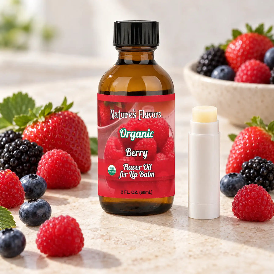 Nature's Flavors Organic Berry Flavor Oil for Lip Balm, 2 oz amber bottle with flavor-matched ingredients and an open lip balm.