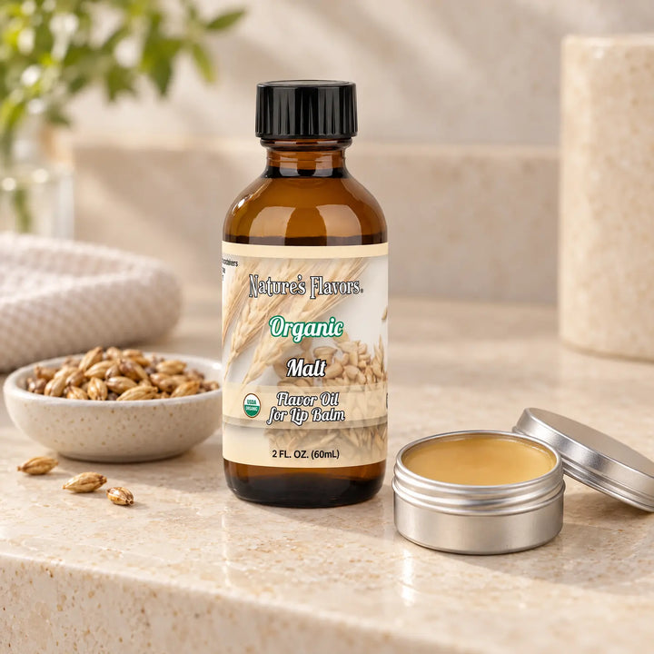 Nature's Flavors Organic Malt Flavor Oil for Lip Balm, 2 oz bottle with flavor cues and an open lip-balm tin.