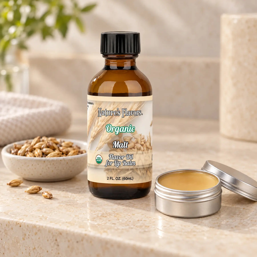Nature's Flavors Organic Malt Flavor Oil for Lip Balm, 2 oz bottle with flavor cues and an open lip-balm tin.