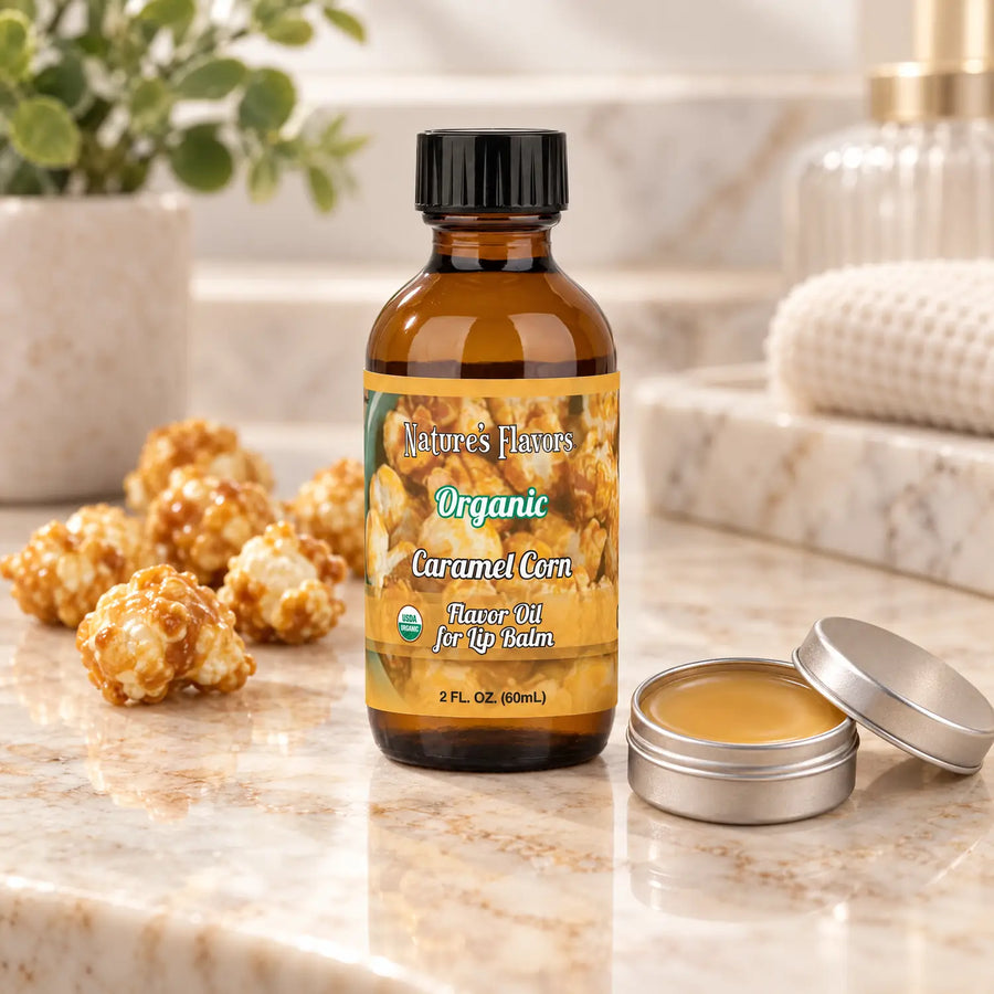 Nature's Flavors Organic Caramel Corn Flavor Oil for Lip Balm, 2 oz bottle with flavor cues and an open lip-balm tin.