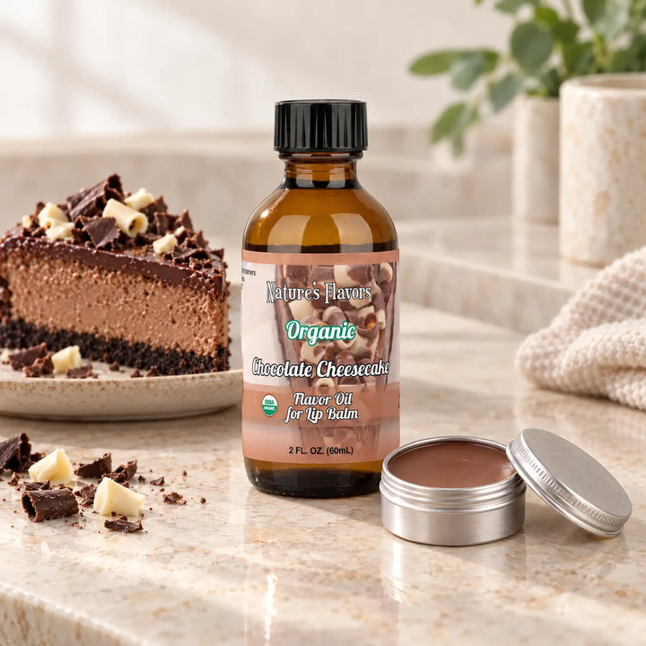 Nature's Flavors Organic Chocolate Cheesecake Flavor Oil for Lip Balm, 2 oz bottle with flavor cues and an open lip-balm tin.