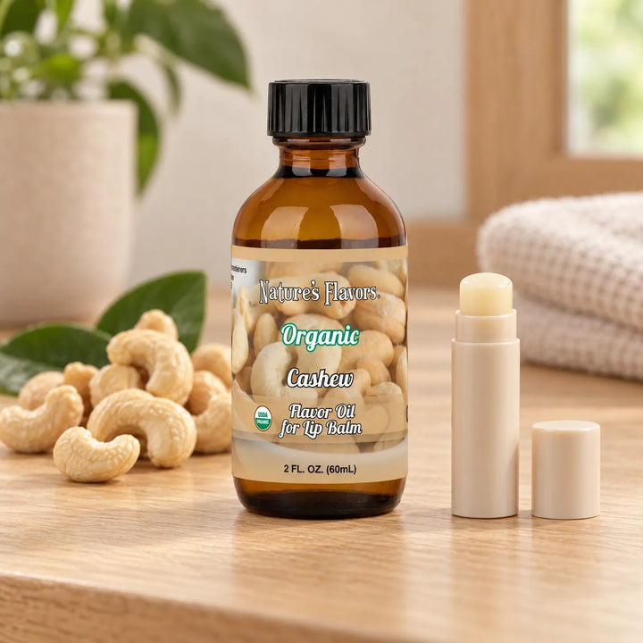 Nature's Flavors Organic Cashew Flavor Oil for Lip Balm, 2 oz bottle with flavor cues and an open lip-balm tube.