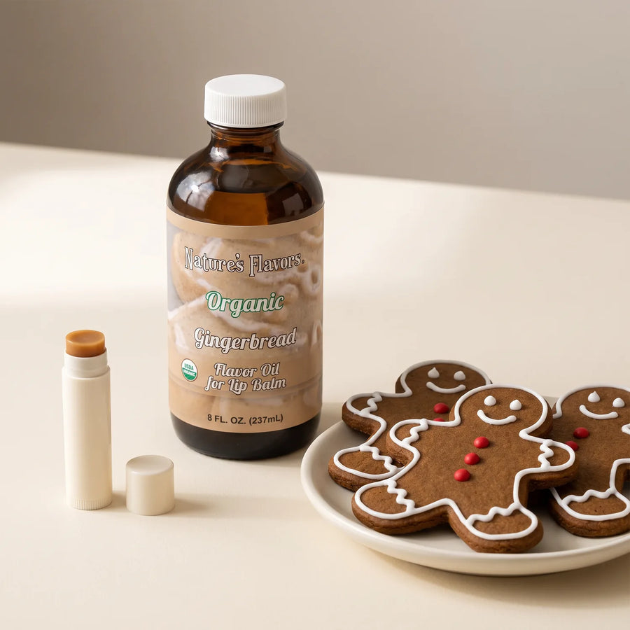 Nature’s Flavors Organic Gingerbread Flavor Oil for Lip Balm, 8 oz bottle with iced gingerbread cookies and an open lip balm tube.