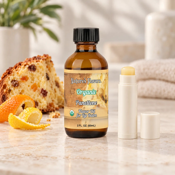 Nature's Flavors Organic Panettone Flavor Oil for Lip Balm, 2 oz bottle with flavor cues and an open lip-balm tube.