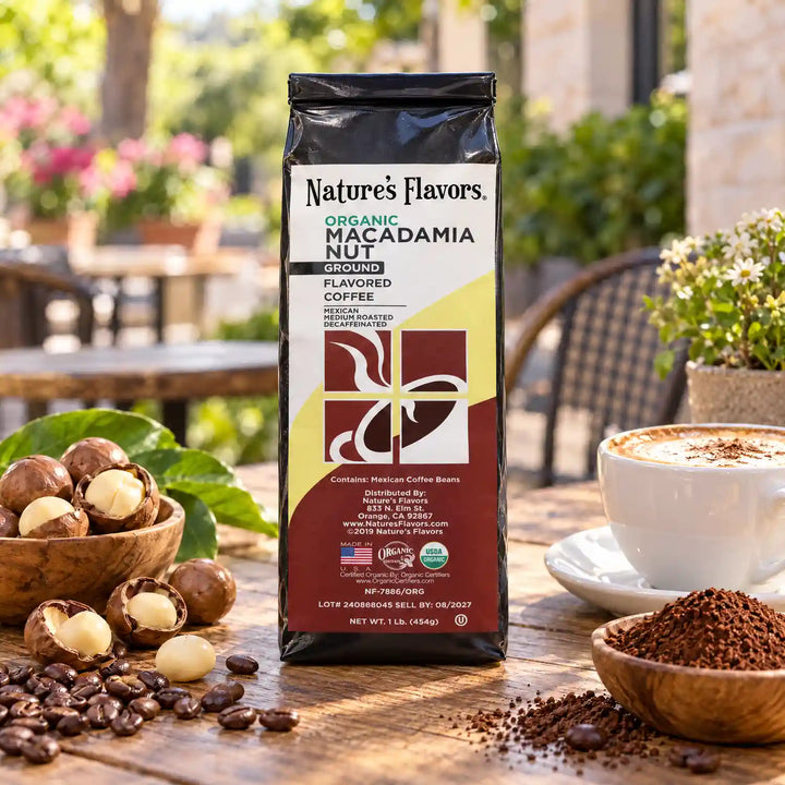 Nature’s Flavors Organic Decaf Macadamia Nut Flavored Coffee Beans, 1 lb. Ground, beside flavor cues, roasted coffee beans, grounds and a filled coffee drink in a bright lifestyle scene.