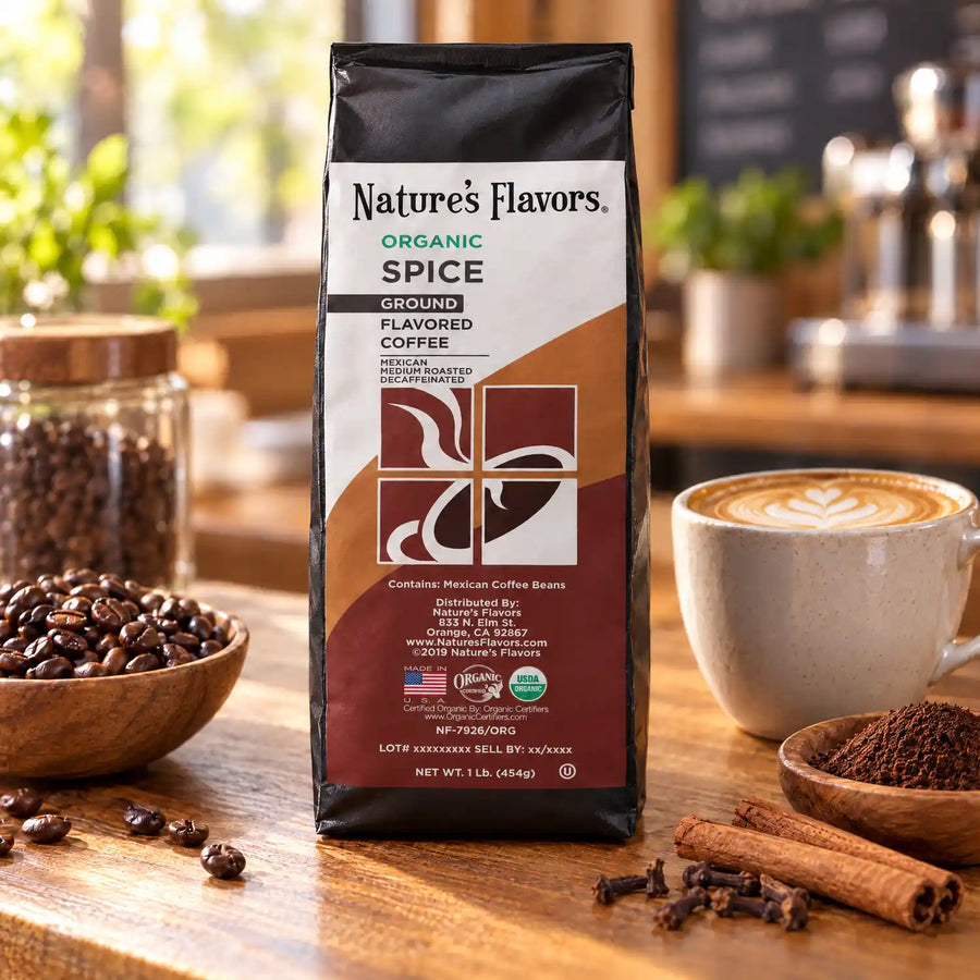 Nature’s Flavors Organic Decaf Spice Flavored Coffee Beans, 1 lb. Ground, beside flavor cues, roasted coffee beans, grounds and a filled coffee drink in a bright lifestyle scene.