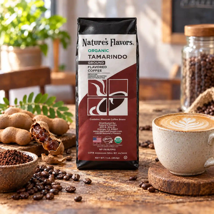 Nature’s Flavors Organic Decaf Tamarindo Flavored Coffee Beans, 1 lb. Ground, beside flavor cues, roasted coffee beans, grounds and a filled coffee drink in a bright lifestyle scene.