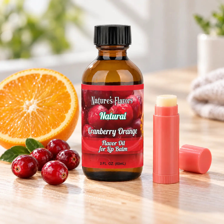Nature's Flavors Cranberry Orange Flavor Oil for Lip Balm, 2 oz amber bottle with flavor-matched ingredients and an open lip balm.