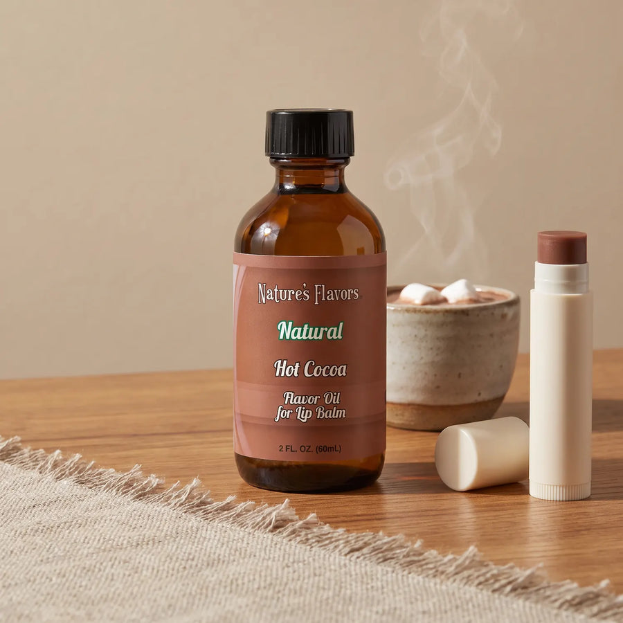 Nature's Flavors Hot Cocoa Flavor Oil for Lip Balm, 2 oz bottle with hot cocoa and an open unbranded lip balm tube.