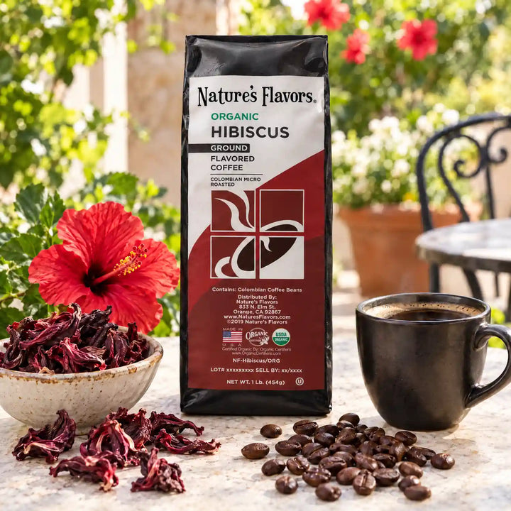 Nature's Flavors Organic Hibiscus Flavored Coffee Beans, 1 lb. Ground, in a bright coffee lifestyle scene.